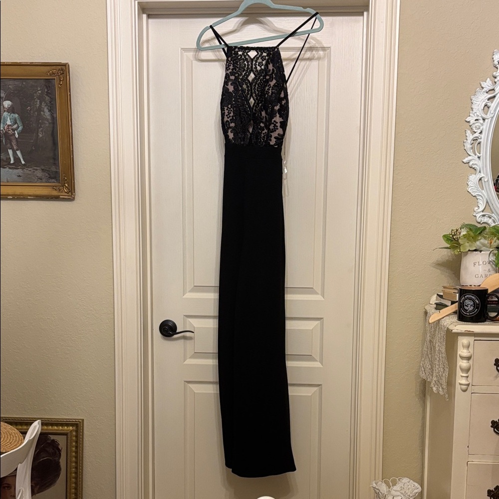 Elegant Black Halter Style Jumpsuit
With Black Lace